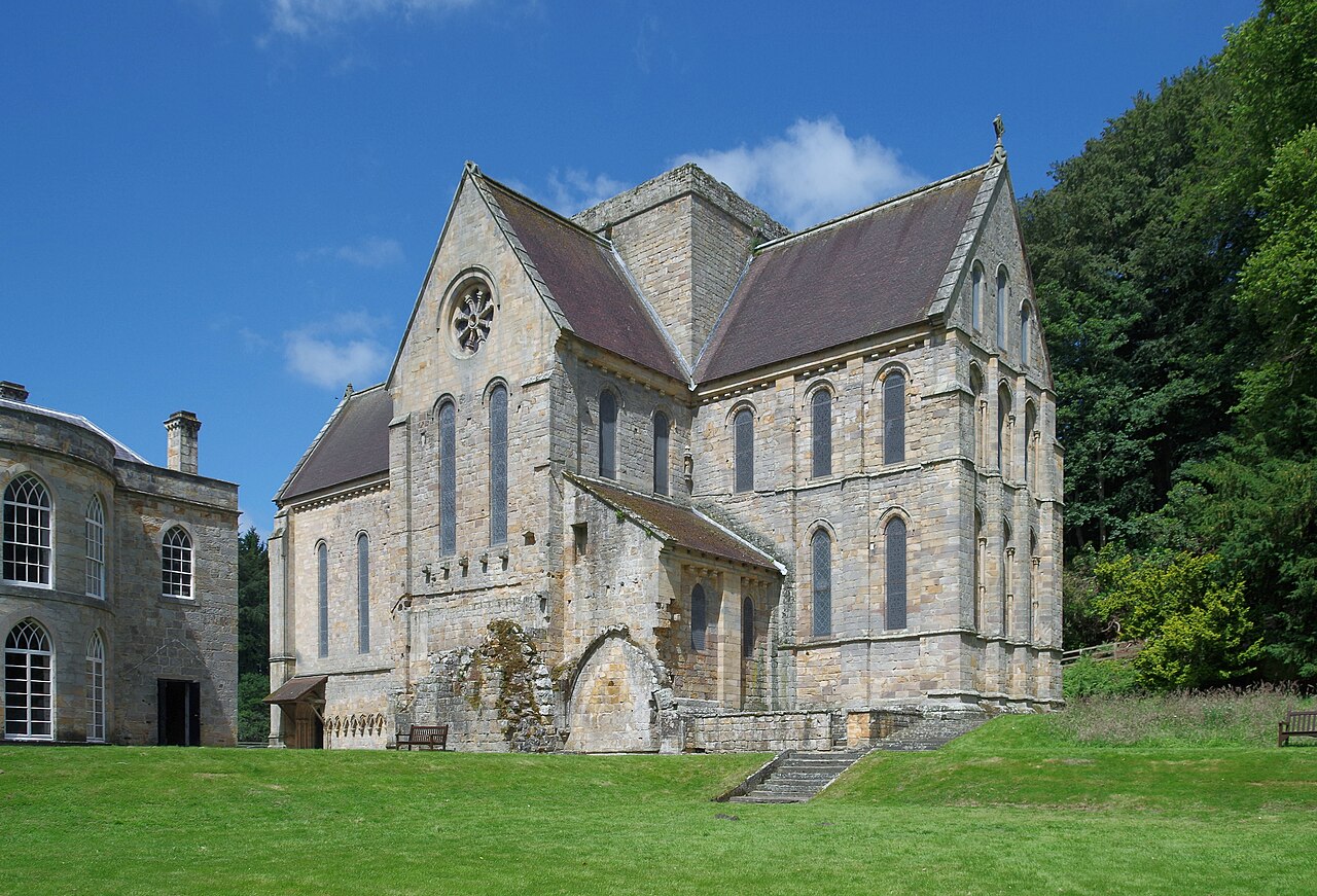 Restored Brinkburn Priory church beside its manor house