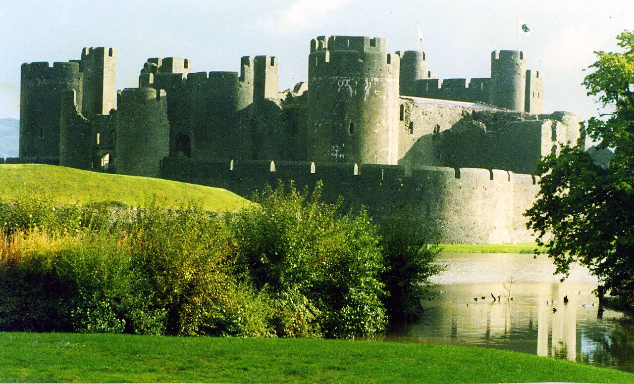 Caerphilly Castle walls and towers seen across the moat