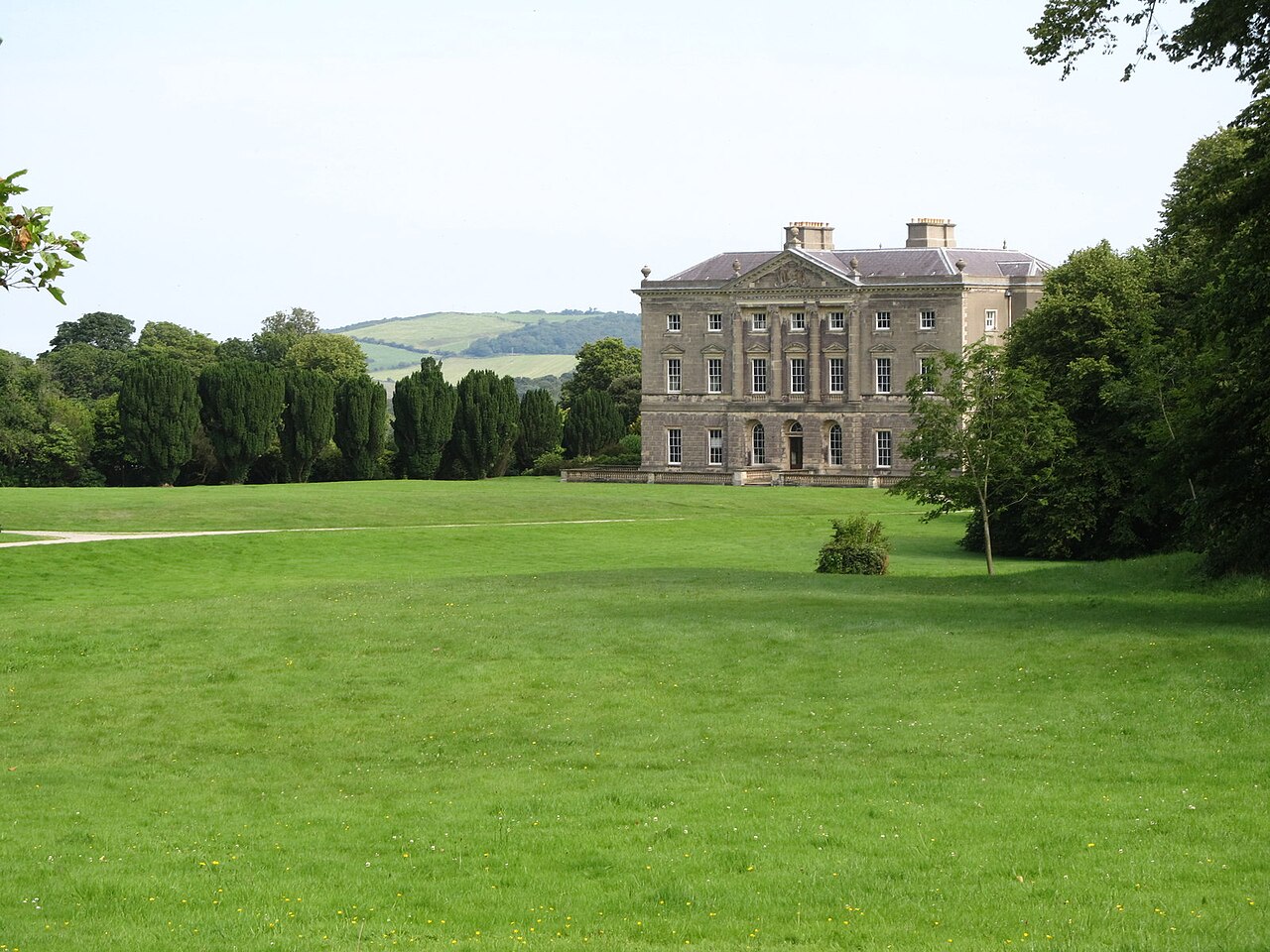 Classical facade of Castle Ward mansion across the lawn