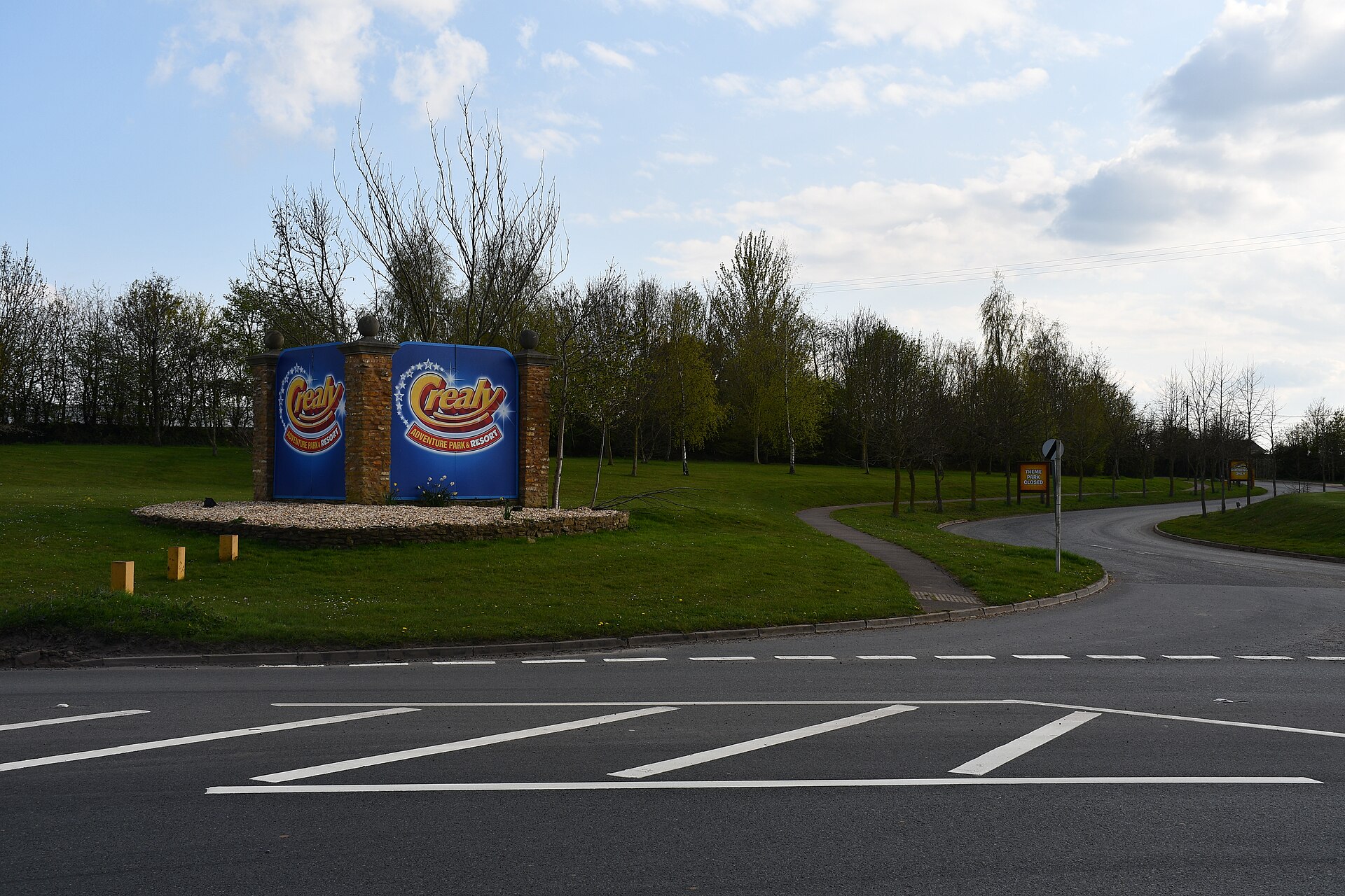 Crealy entrance signs beside the approach road