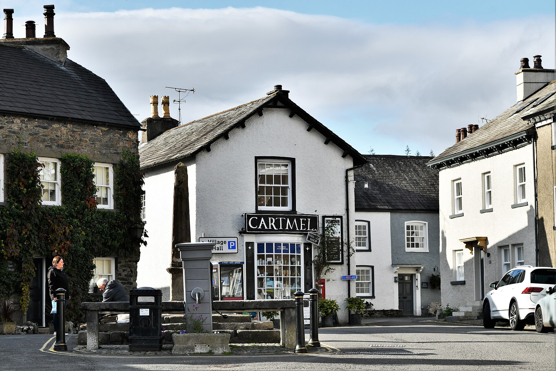 The Square, village cross and pump in Cartmel