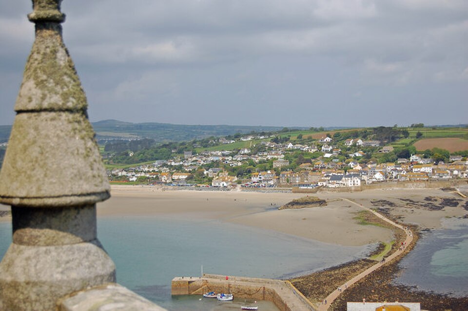 Marazion town and shore viewed across the water from St Michael's Mount