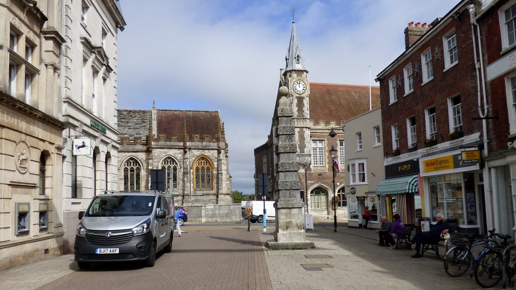 Dorchester town pump and historic Dorset town-centre buildings