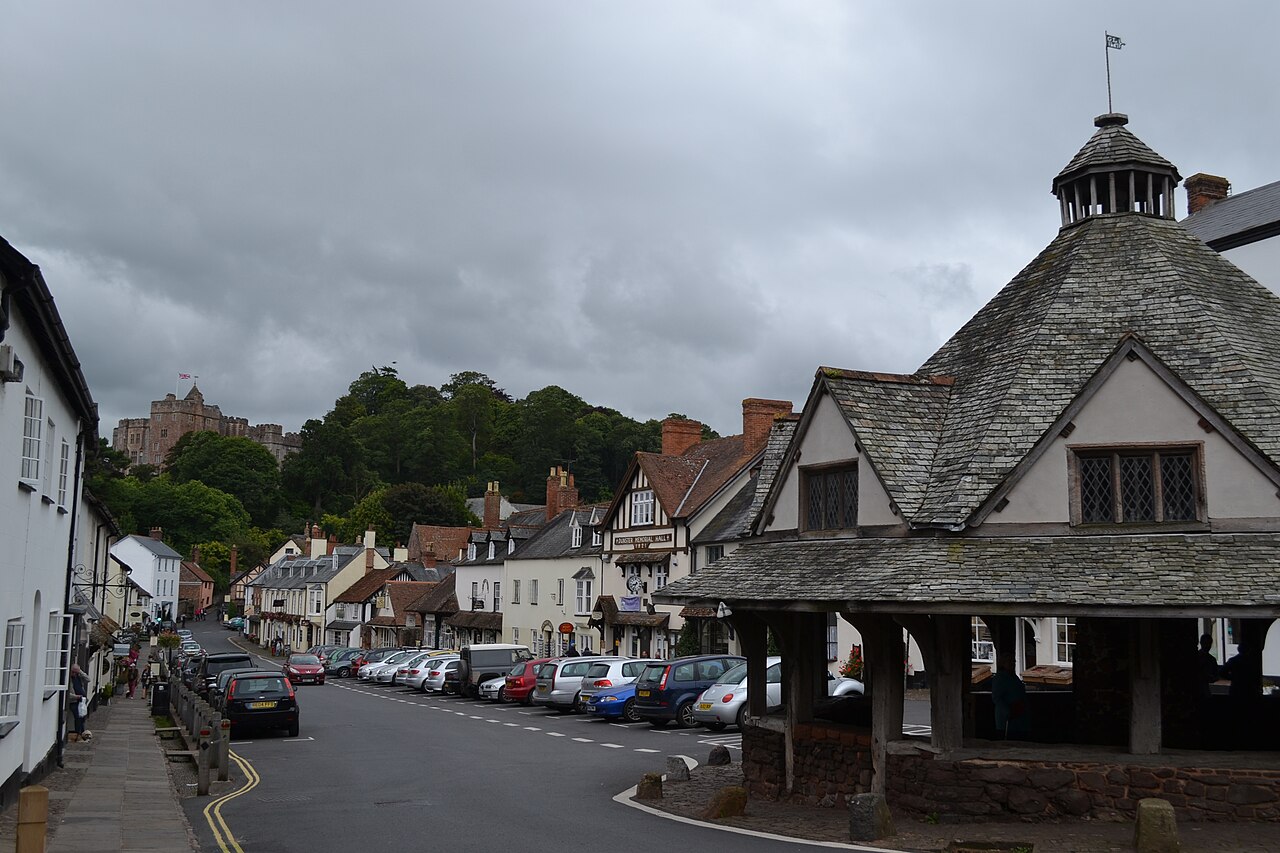 Dunster Yarn Market with the castle beyond High Street