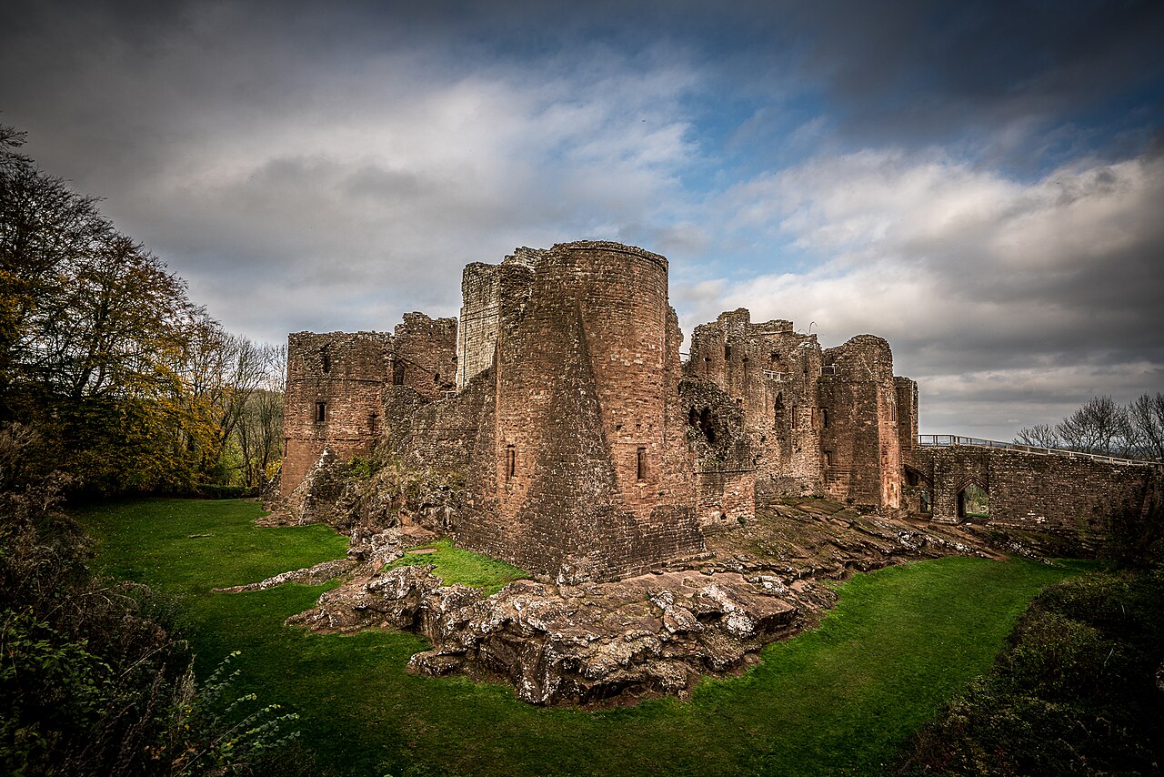 Goodrich Castle stone keep and curtain walls on a Wye Valley crag