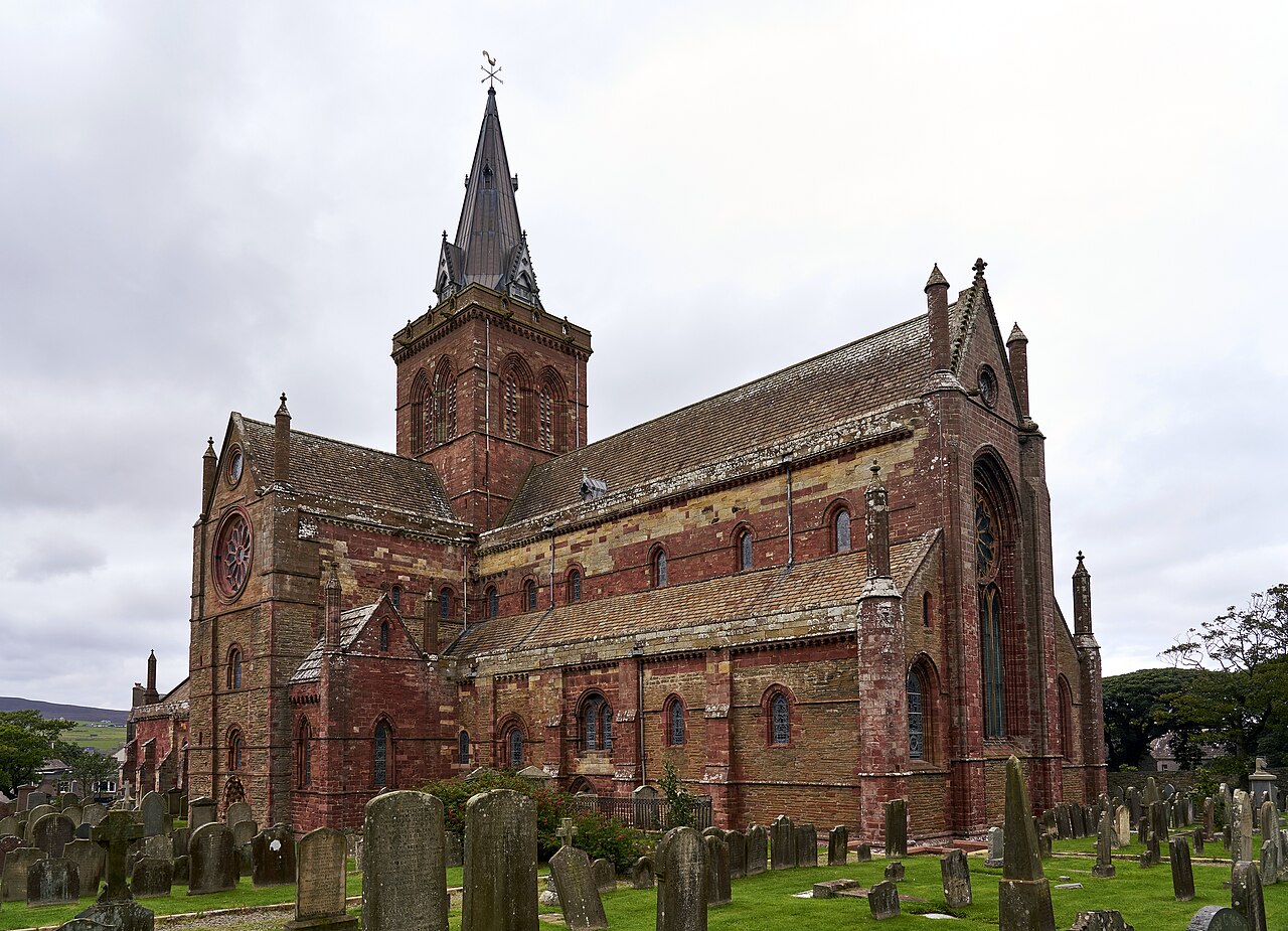 Red sandstone St Magnus Cathedral and churchyard in Kirkwall