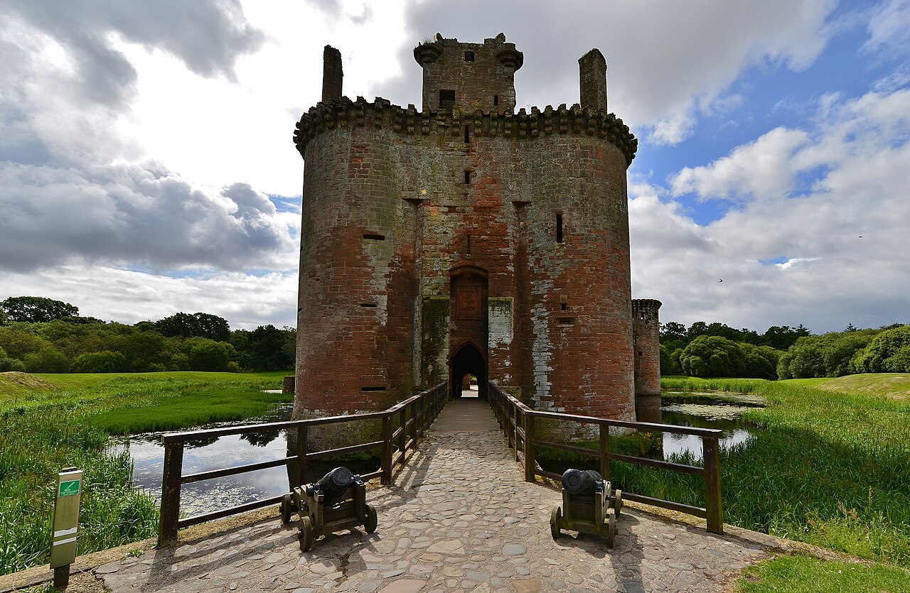 Twin towers and bridge across the moat at Caerlaverock Castle