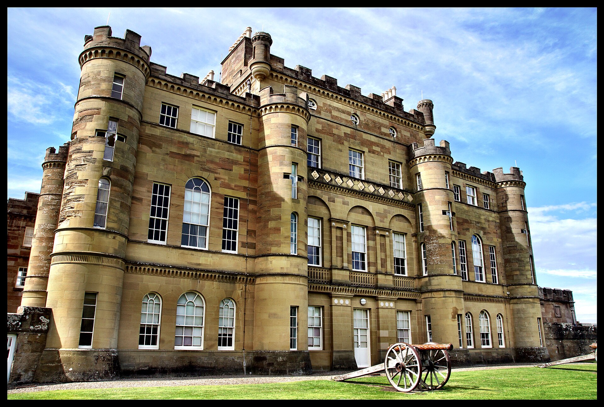 Robert Adam facade of Culzean Castle with cannon on the Ayrshire cliff estate