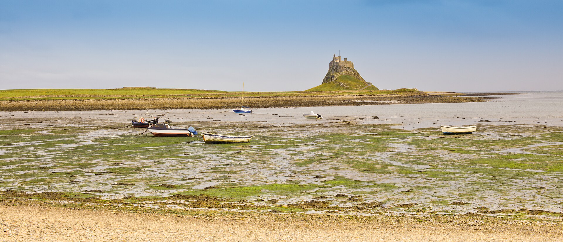 Lindisfarne Castle rising above the tidal shore of Holy Island