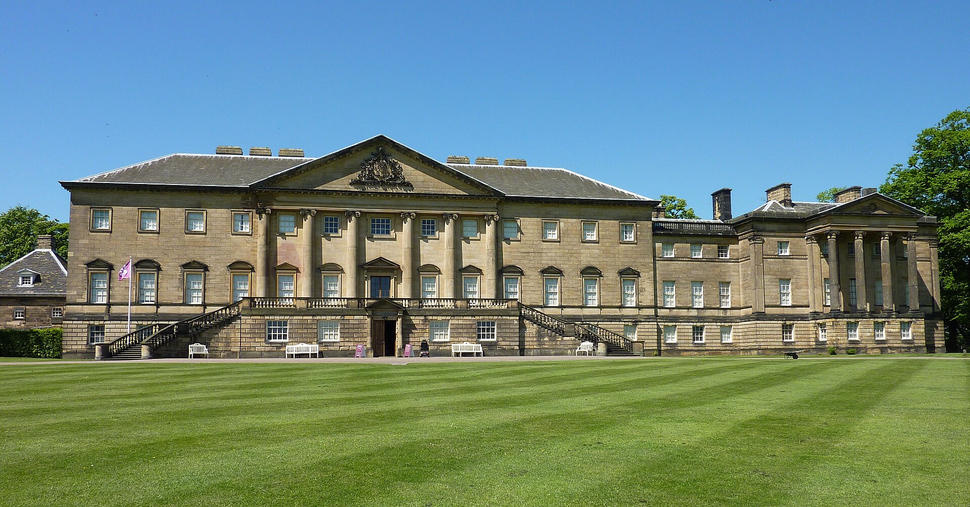 Long Georgian front of Nostell house above a broad lawn