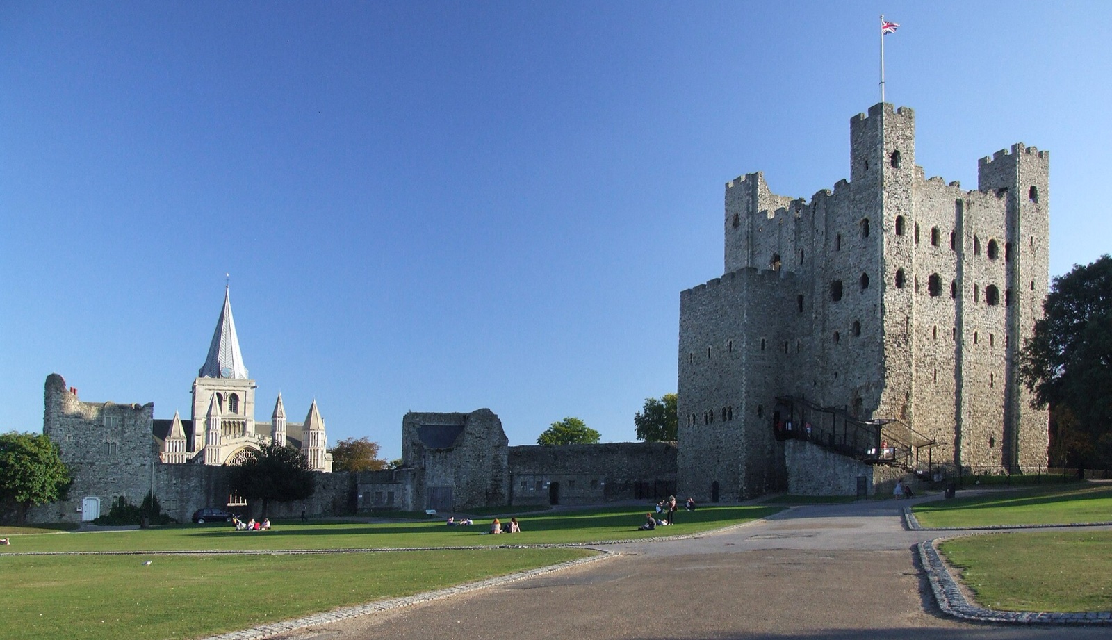 Rochester Castle keep with the cathedral visible beyond the bailey