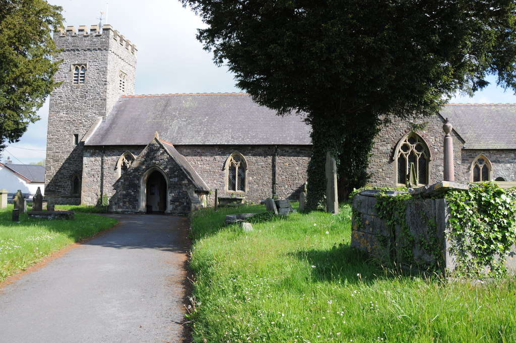 Stone church and churchyard in Llangadog