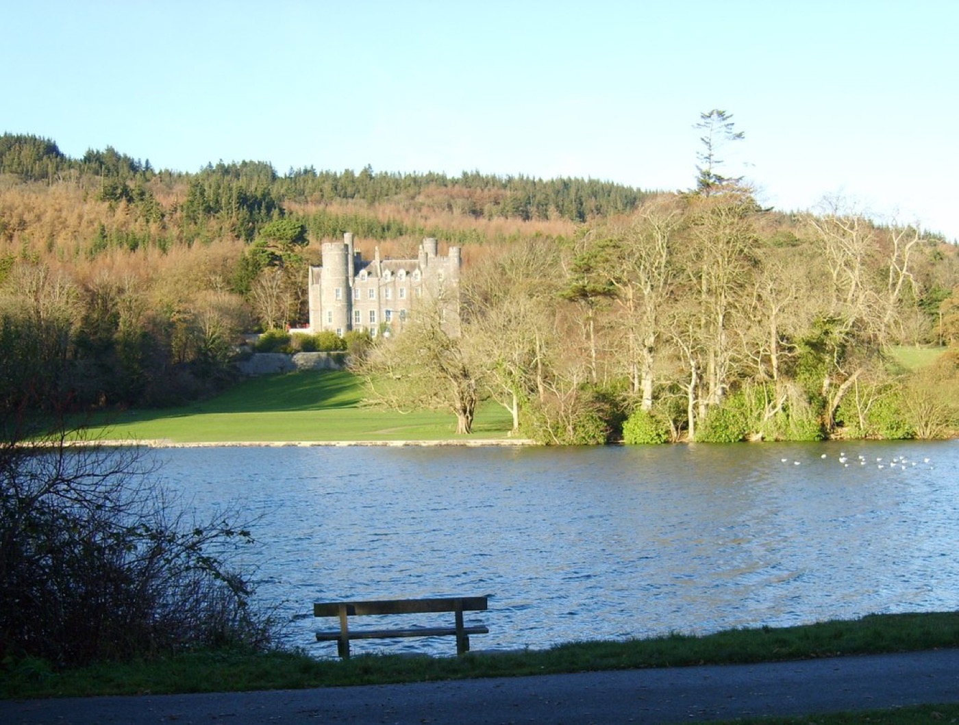 Castlewellan Castle seen across the lake in Castlewellan Forest Park