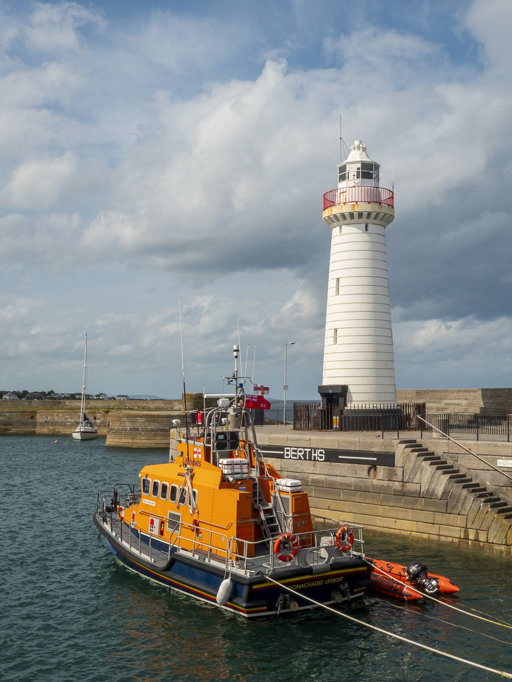 Donaghadee harbour with a lifeboat and lighthouse