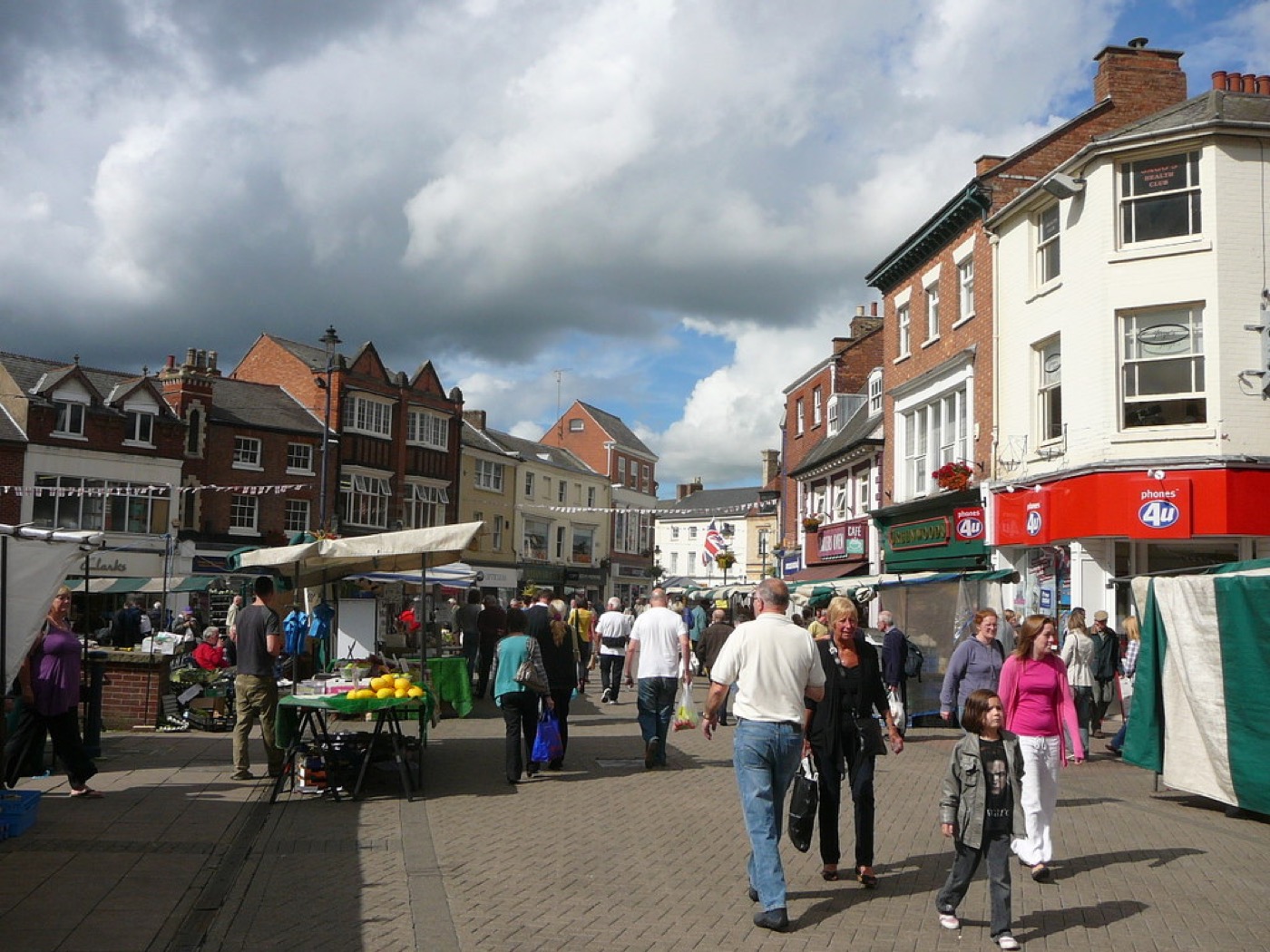 Market stalls and shoppers in Melton Mowbray