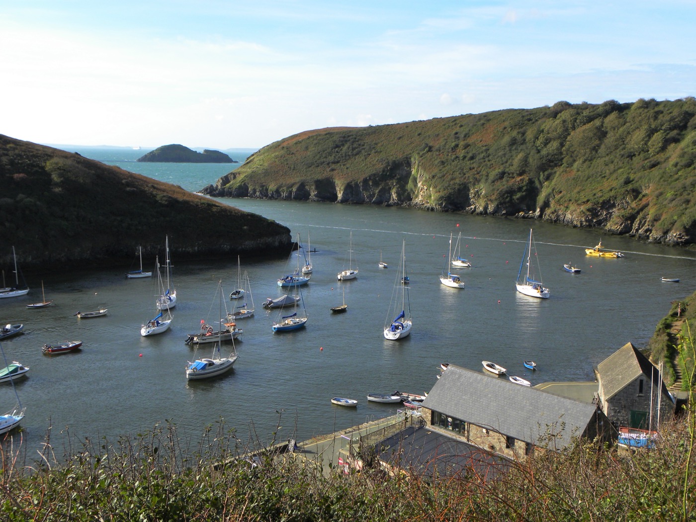 Solva harbour with boats and the surrounding coast
