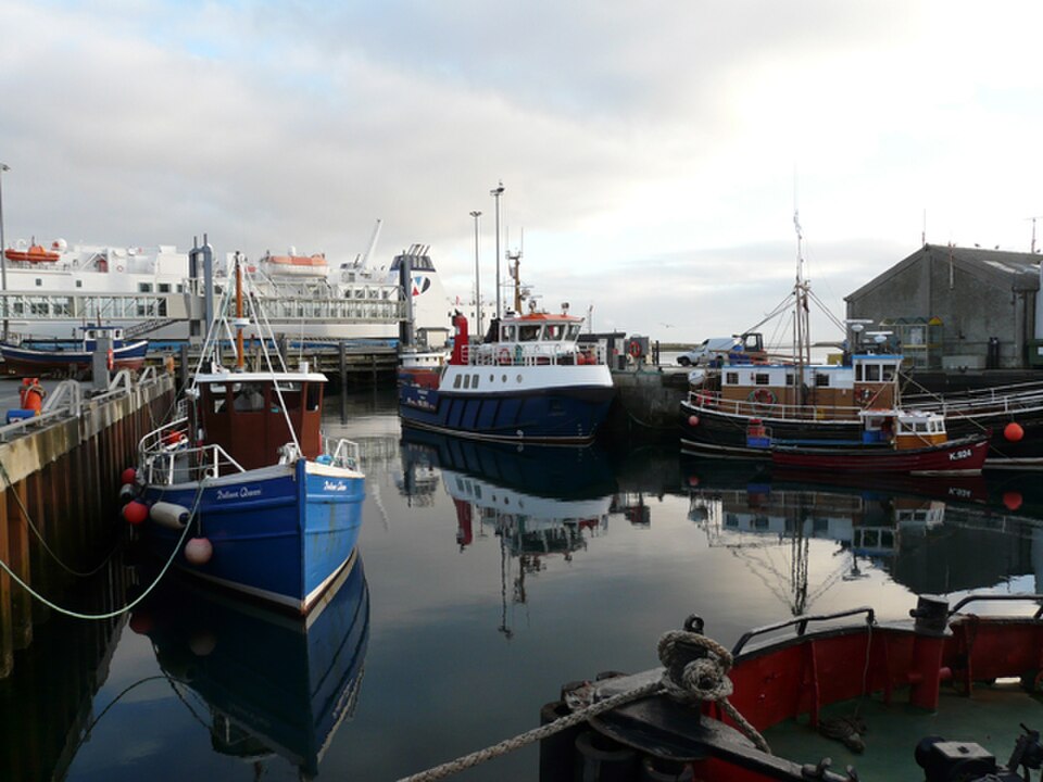 Fishing boats and harbour buildings at Stromness
