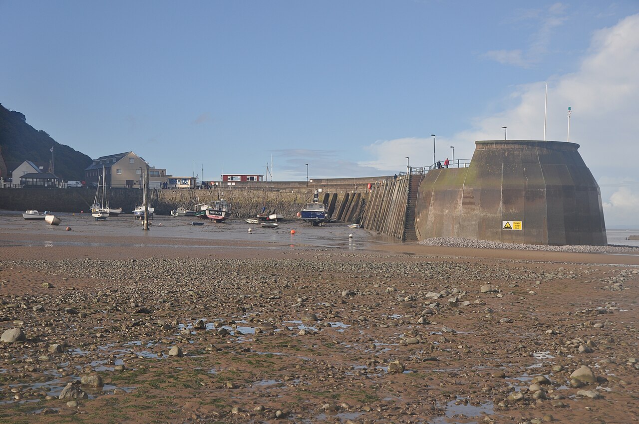 Minehead harbour and moored boats at low tide