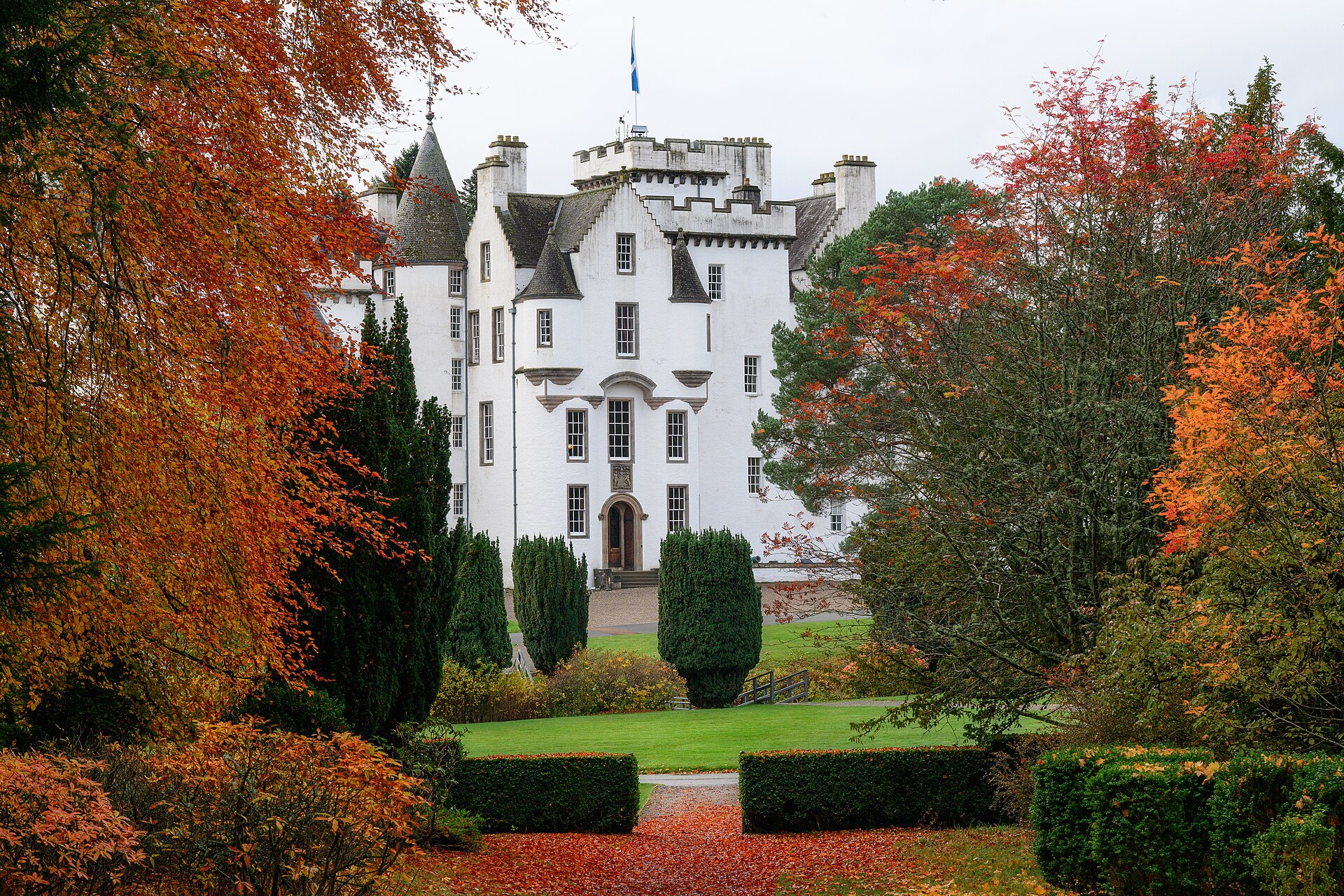 Blair Castle framed by autumn foliage