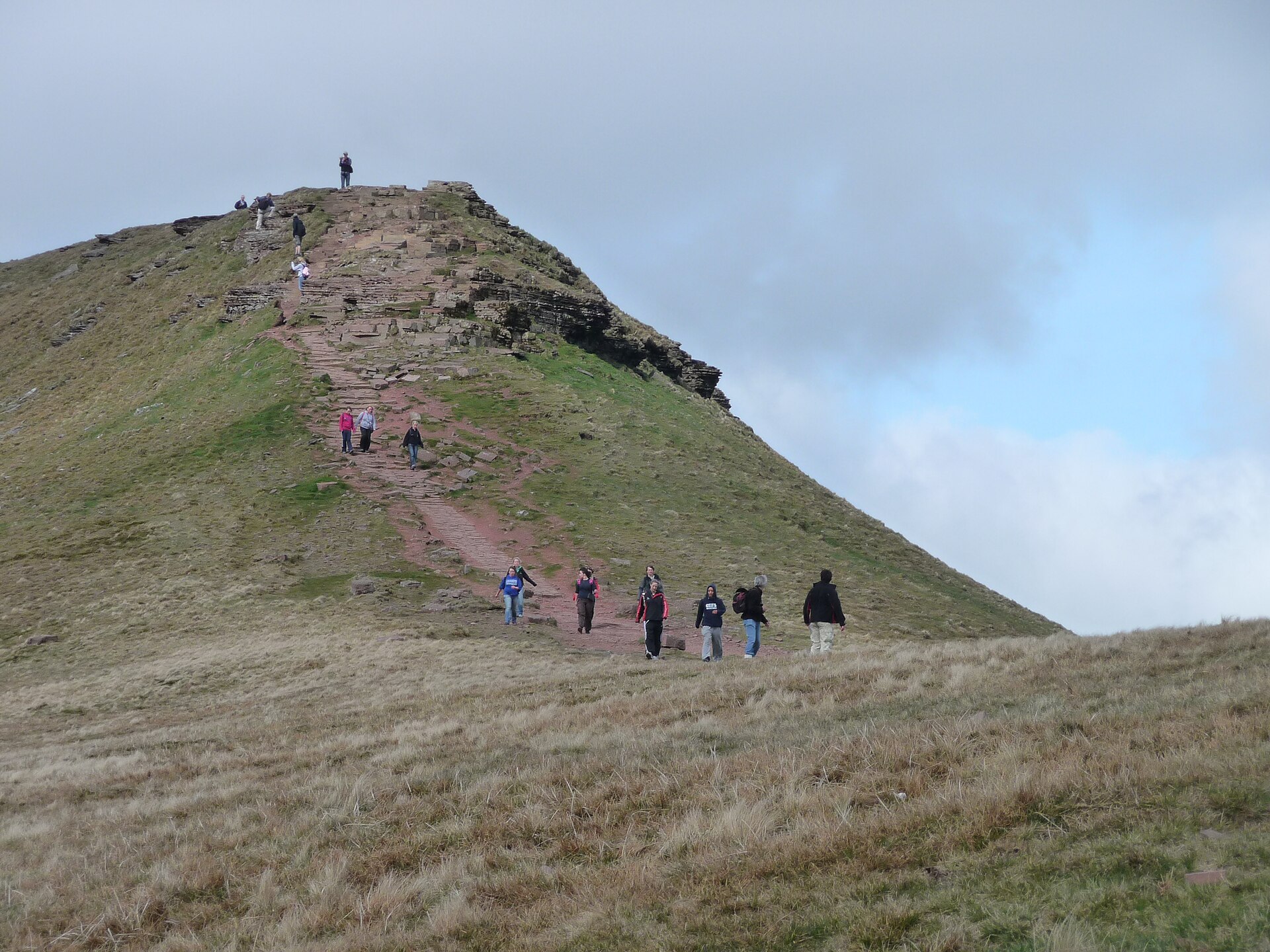 Walkers on the rocky summit approach at Pen y Fan