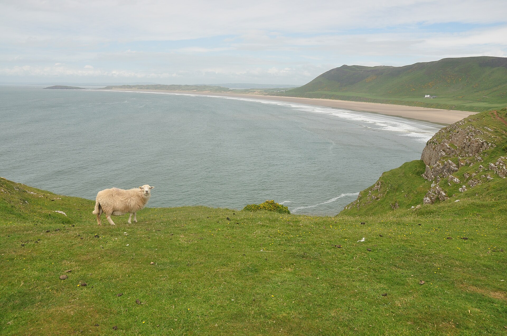Rhossili Bay and Rhossili Down from the mainland headland