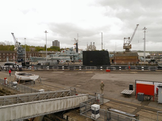 Naval ship and dockside cranes at The Historic Dockyard Chatham