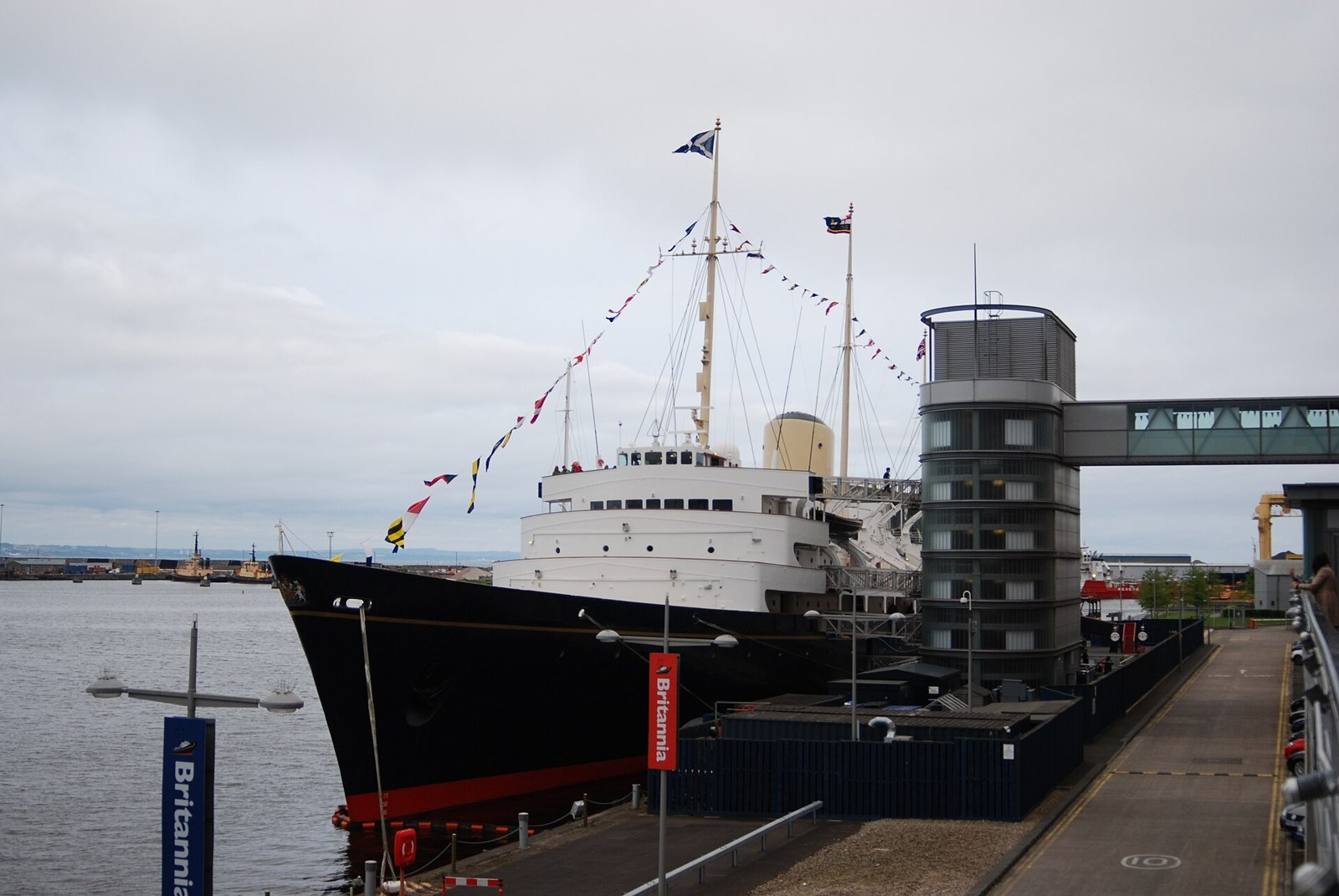 Royal Yacht Britannia moored beside the Ocean Terminal visitor access tower