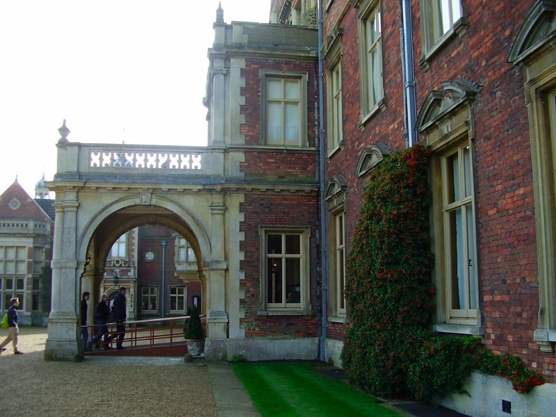 Red-brick exterior and arched entrance of Sandringham House
