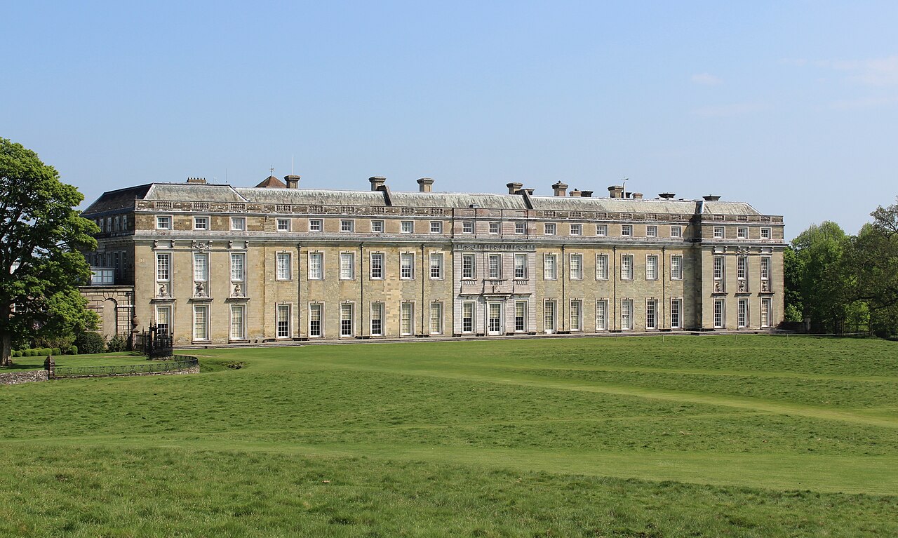 Petworth House viewed across its parkland