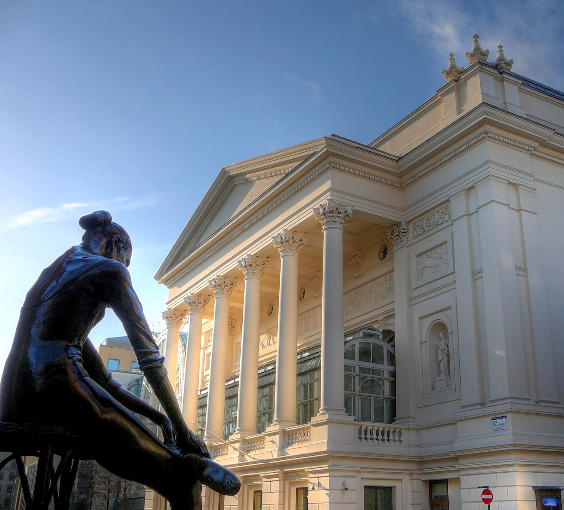 Royal Opera House exterior behind a ballerina sculpture