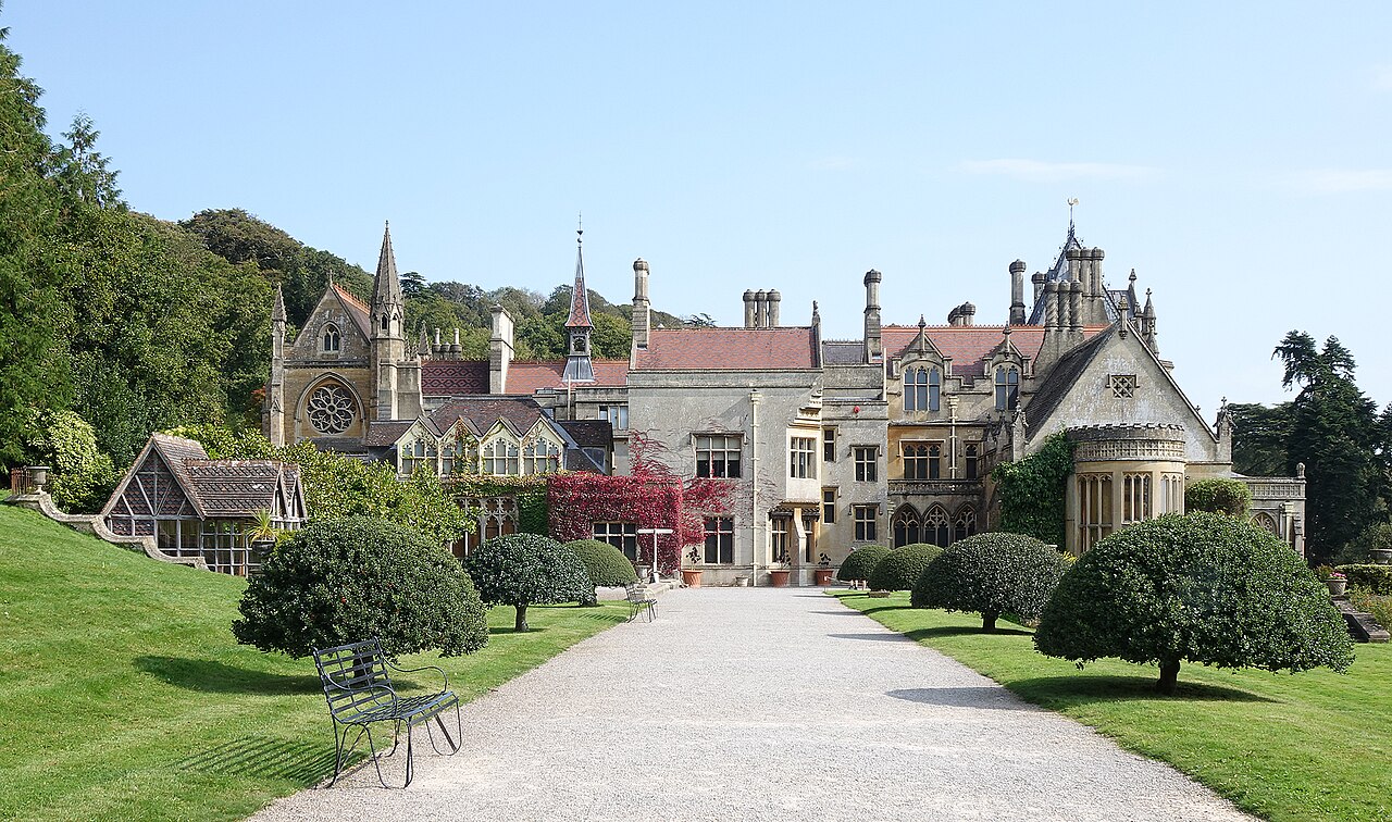 Gothic Tyntesfield house beyond a garden path